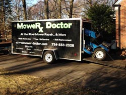 Riding Mower in Mobile Lawn Mower Repair Trailer - 3